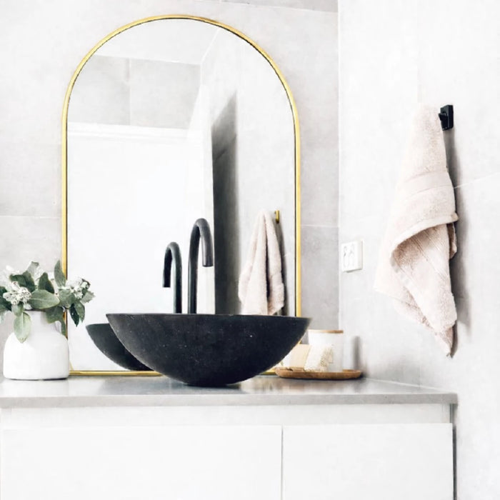 Gold framed arched mirror. 1000 x 700